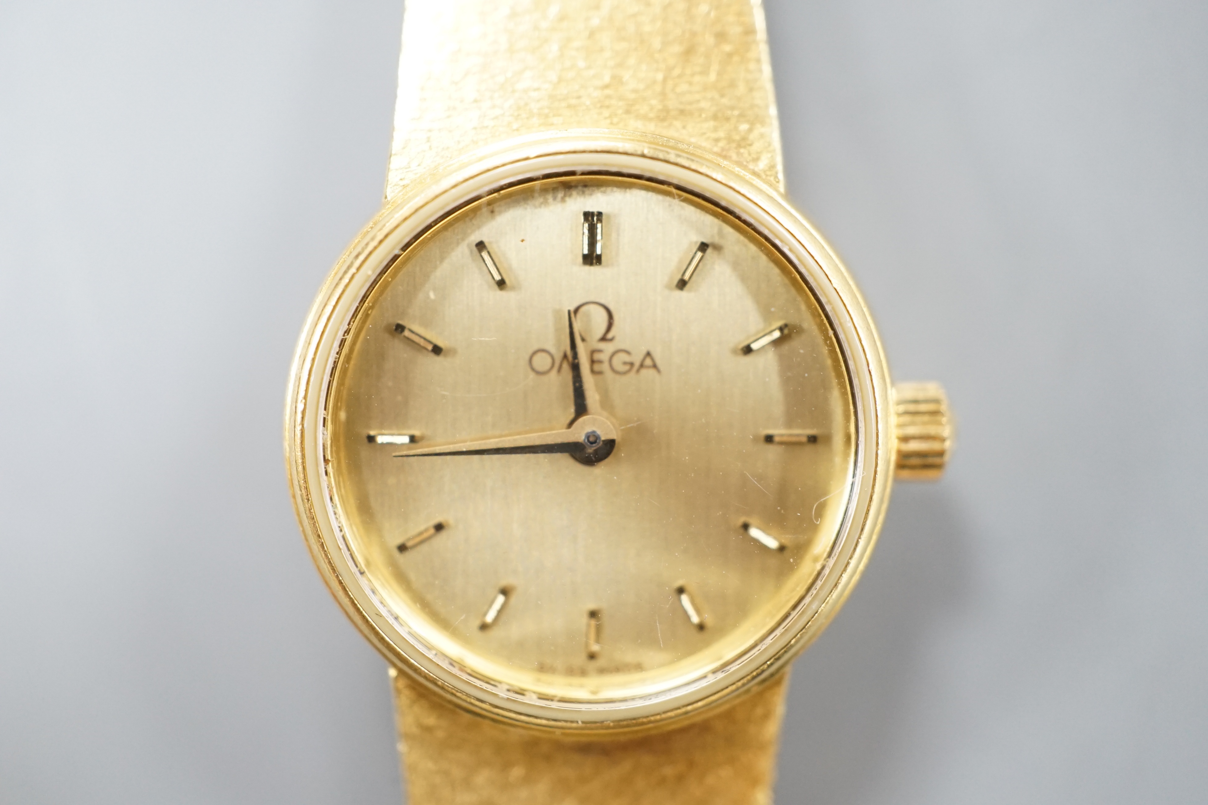 A lady's 18ct gold Omega quartz wrist watch